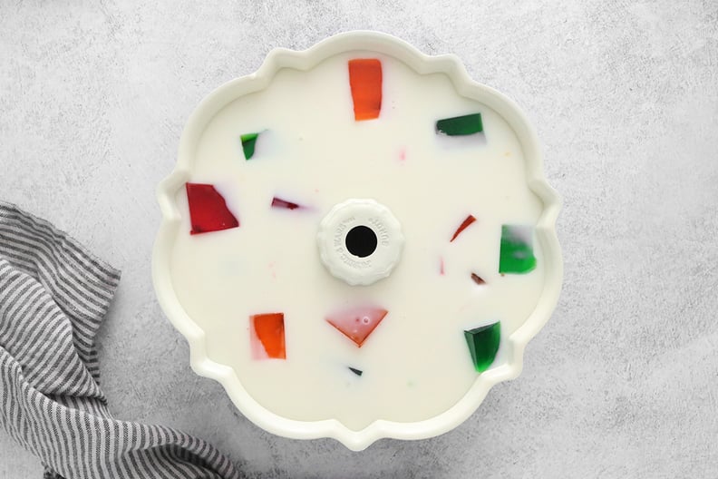 Cream jelly and cubes of gelatin in a Bundt pan