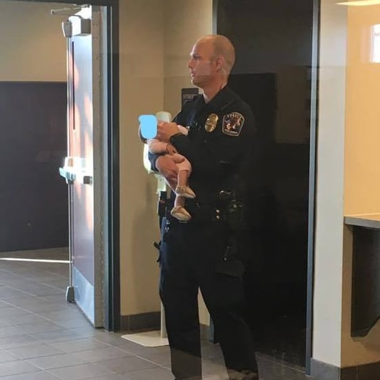 Police Officer Holds Baby For Mom at the Station