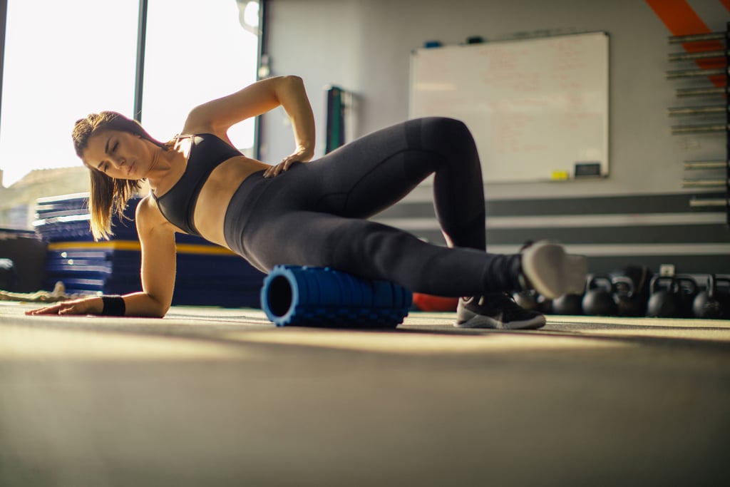 Should I Foam Roll Before or After a Workout? POPSUGAR Fitness