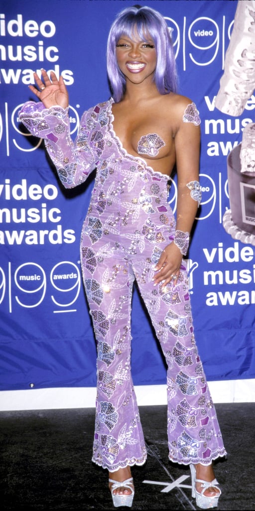 The Story Behind Lil' Kim's Purple Jumpsuit at MTV VMAs