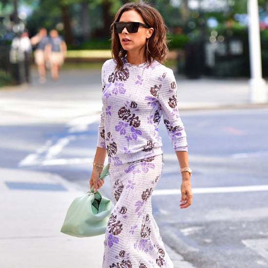 Victoria Beckham Wearing Purple Floral Dress at Fashion Week