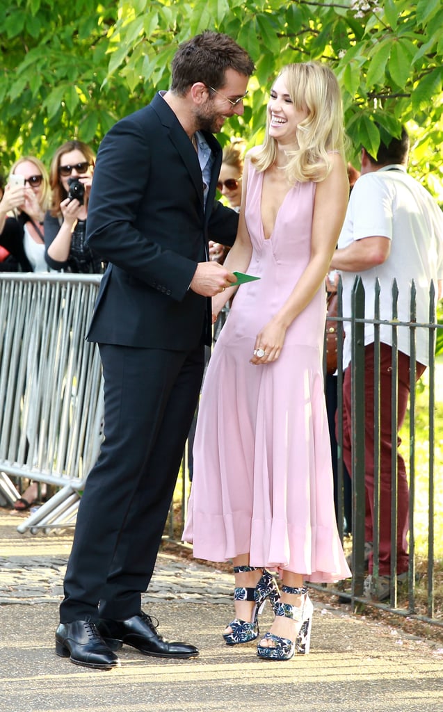 Bradley Cooper and Suki Waterhouse laughed together at the annual Serpentine Gallery Summer Party on Tuesday in London's Hyde Park.