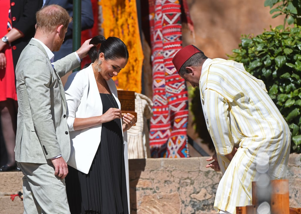 Prince Harry Helping Meghan Markle Fix Her Hair in Morocco