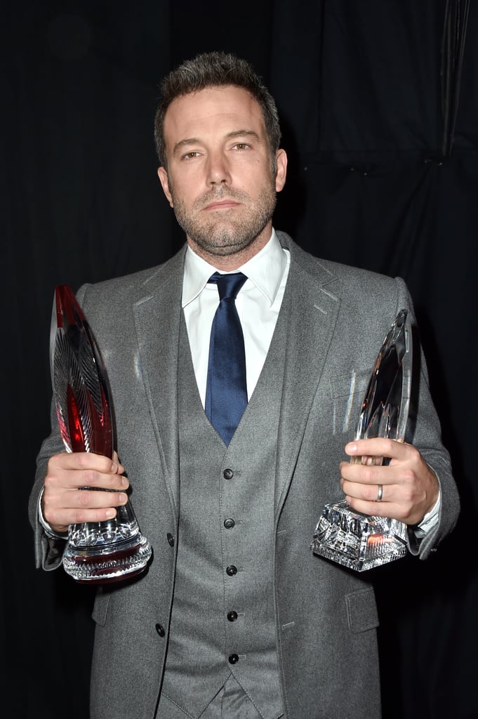 Ben Affleck held up his two awards.