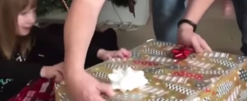 Video of Cat Sneaking Out of Christmas Box