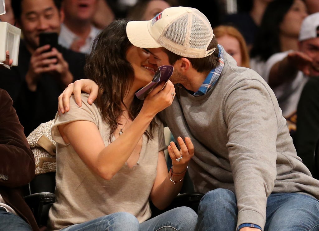 Mila Kunis and Ashton Kutcher at Lakers Game Dec. 2014