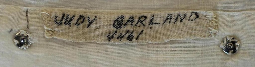 Judy Garland's name is stitched on the interior lining of the dress.