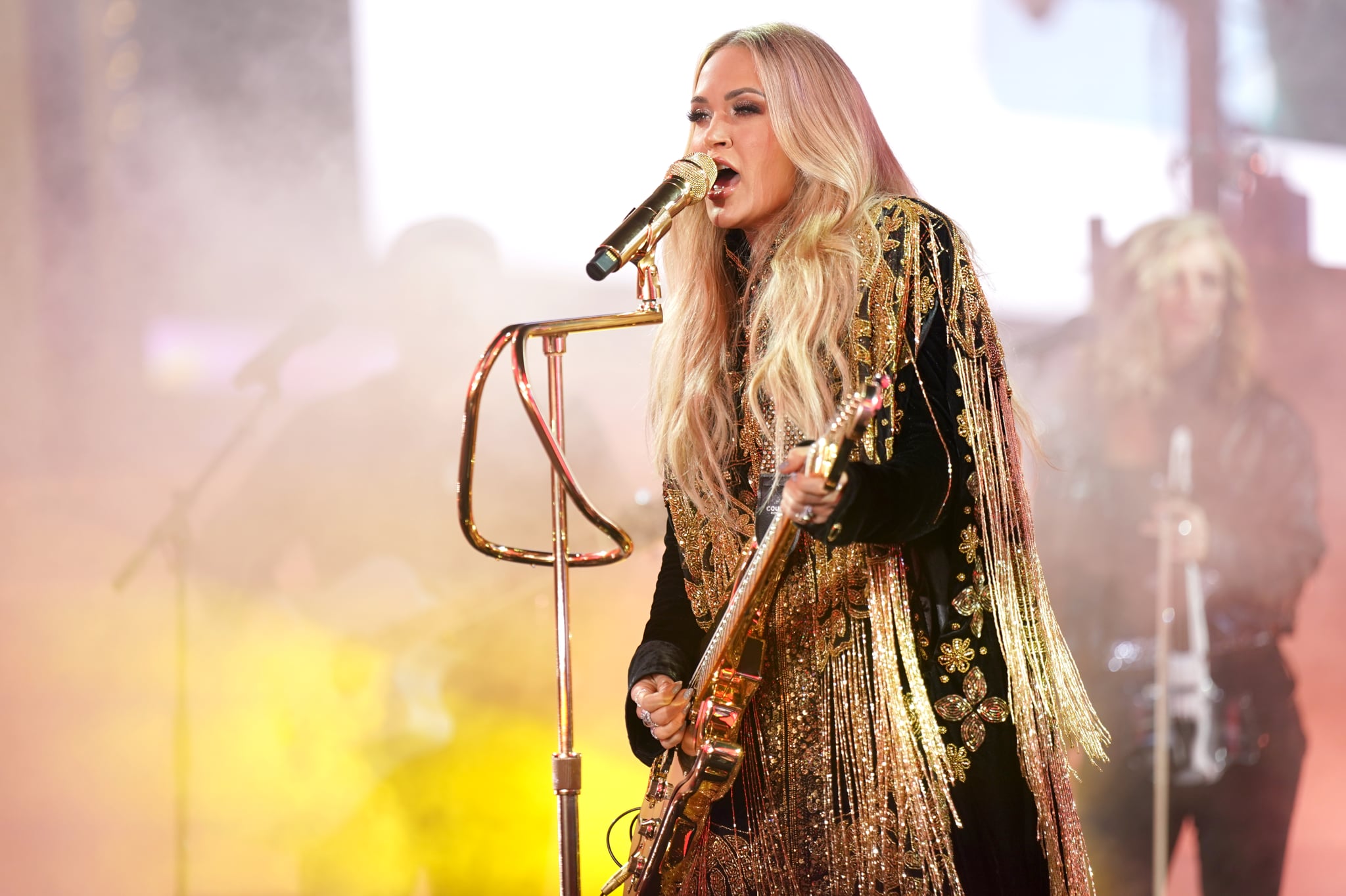 Country musician Carrie Underwood performed on New Year's Eve. Underwood agreed to sing 'America the Beautiful' at Donald Trump's presidential inauguration.