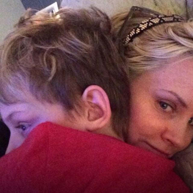 A makeup-free Jenny McCarthy got a hug from Evan Asher. 
Source: Instagram user jennyannmccarthy
