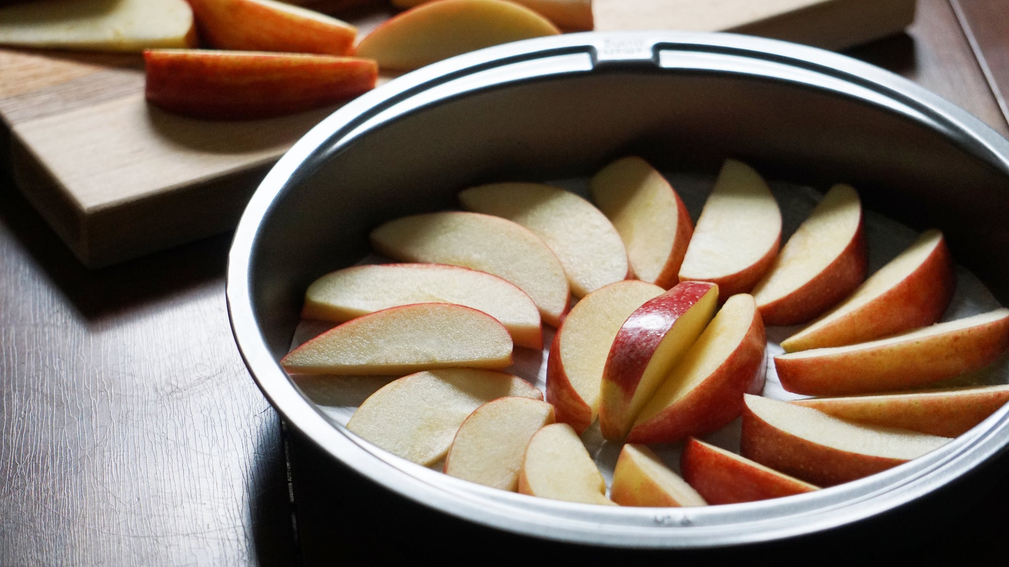 apple honey upside down cake for rosh hashanah dessert: placing apples in pan