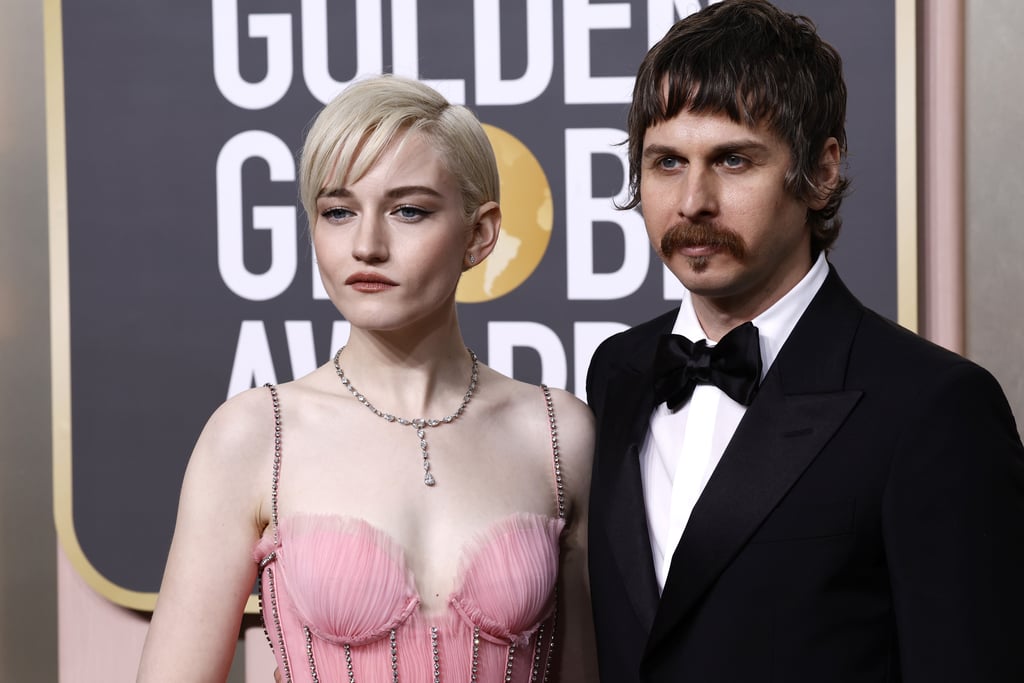 Julia Garner and Mark Foster at the 2023 Golden Globes