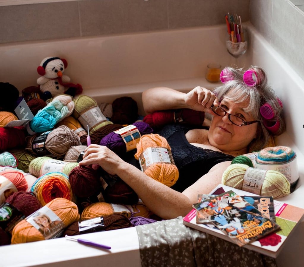Grandma Poses For Boudoir Photo Shoot in Bathtub of Yarn