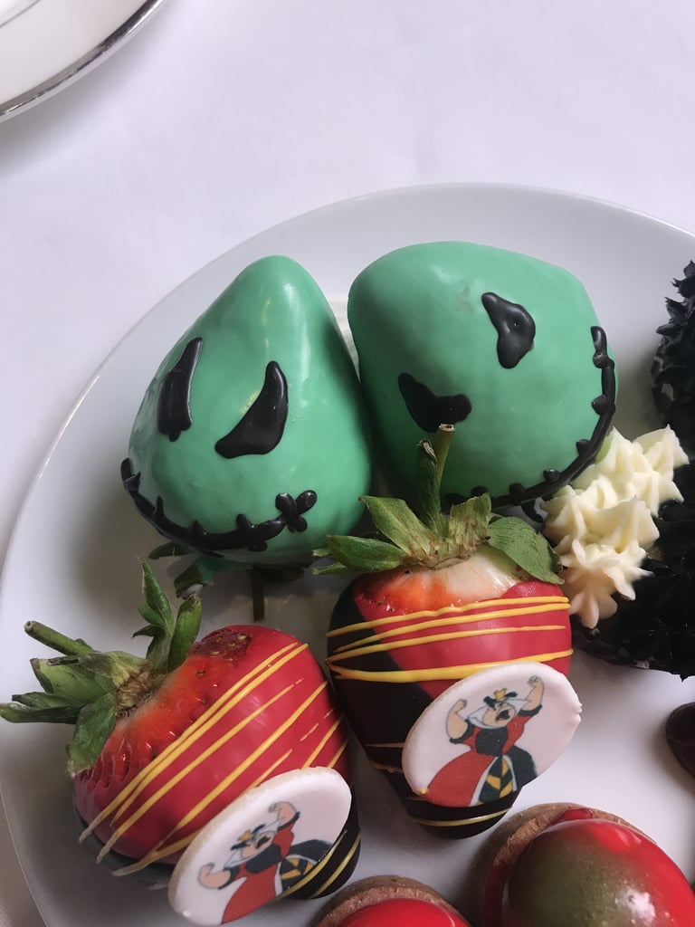 Each snack on each tier is themed after a Disney villain. Say hello to Oogie Boogie and Queen of Hearts chocolate-covered strawberries.