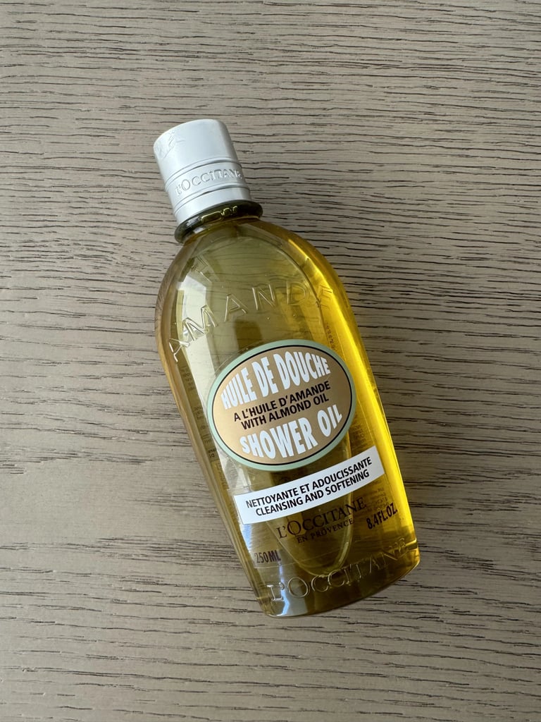 L'occitane Cleansing & Softening Almond Shower Oil ($23, originally $29)
If you're looking to upgrade from a bar of soap, this cult-favorite shower oil will change everything. It creates a milky lather with soothing notes of warm vanilla and sweet almond that softens, cleanses, and hydrates. It even doubles as a shaving base and can be poured into a bath for a fragrant, skin-softening soak. One editor raved about it in her L'occitane Cleansing & Softening Almond Shower Oil review.
Editor Quote: "The brand claims one bottle of this product sells every 10 seconds worldwide. It's packed with sweet almond oil and grapeseed oil, and after using it for less than a week, I can truly tell why it's so popular. Unlike traditional body washes, this shower oil foams to clean off the day, producing a sweet (and not super overpowering) fragrance that leaves my skin the smoothest it's ever been from a shower wash. Before I even step out of the shower I notice that my skin looks and feels more hydrated." — Natasha Marsh, Popsugar contributor