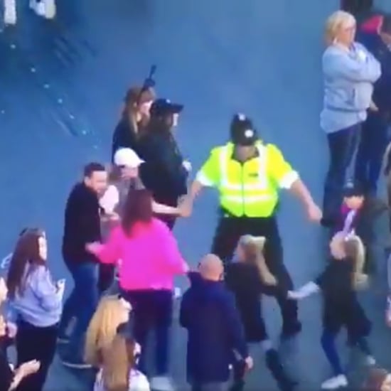 Police Officer Dancing With Kids at Manchester Concert