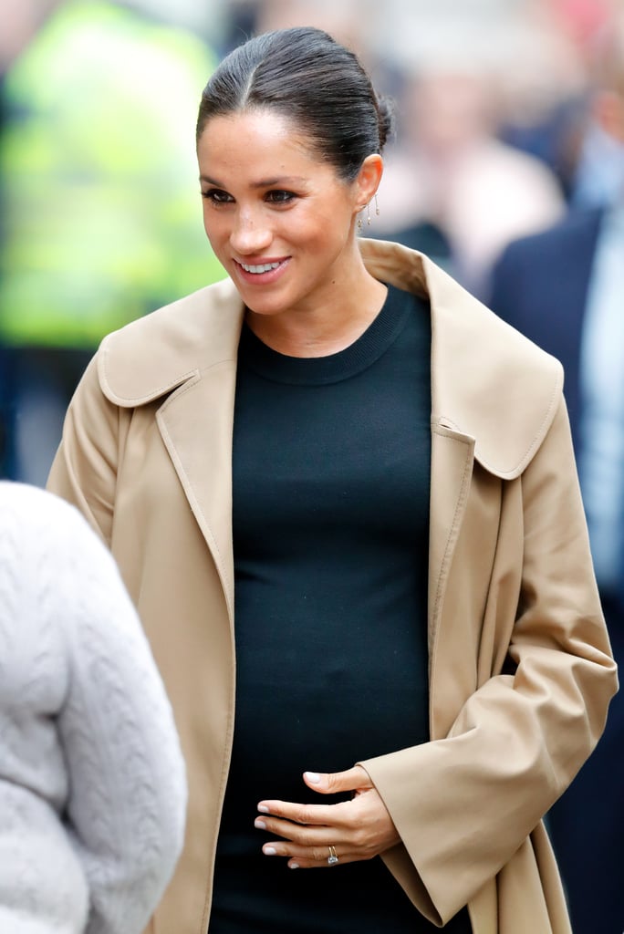 Meghan Markle Touching Baby Bump Pictures