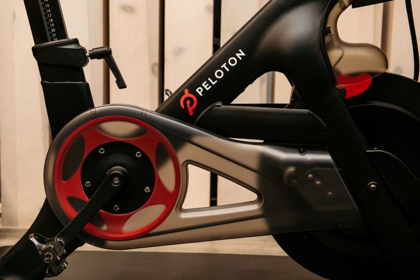 A Peloton stationary bike sits on display at one of the fitness company's studios: how much is a peloton bike?