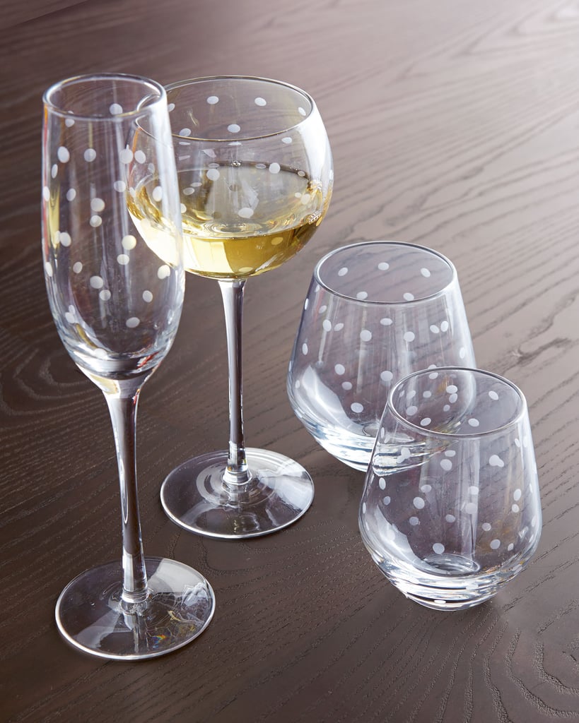 Hostess gifts are always tricky, but you can never go wrong with your favorite bottle of wine, am I right or am I right?! Here is the perfect set to cheers with: Kate Spade New York Larabee Dot Glassware ($50).