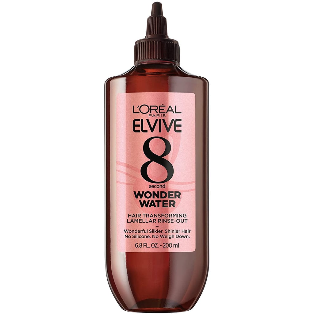 The innovative lamellar technology in the L'Oréal Paris Elvive 8 Second Wonder Water ($9) targets damaged hair and delivers actives like amino acids and protein to repair the hair cuticle. In just eight seconds, the active ingredients bind to the weak areas to smooth and nourish the hair fibres where it's needed. 
After you shampoo, the liquid formula works its magic on the lengths of wet hair in a matter of seconds before you rinse it out. Then, you can follow up with a conditioner and let your hair air dry, like Ryan did, or blow it out.