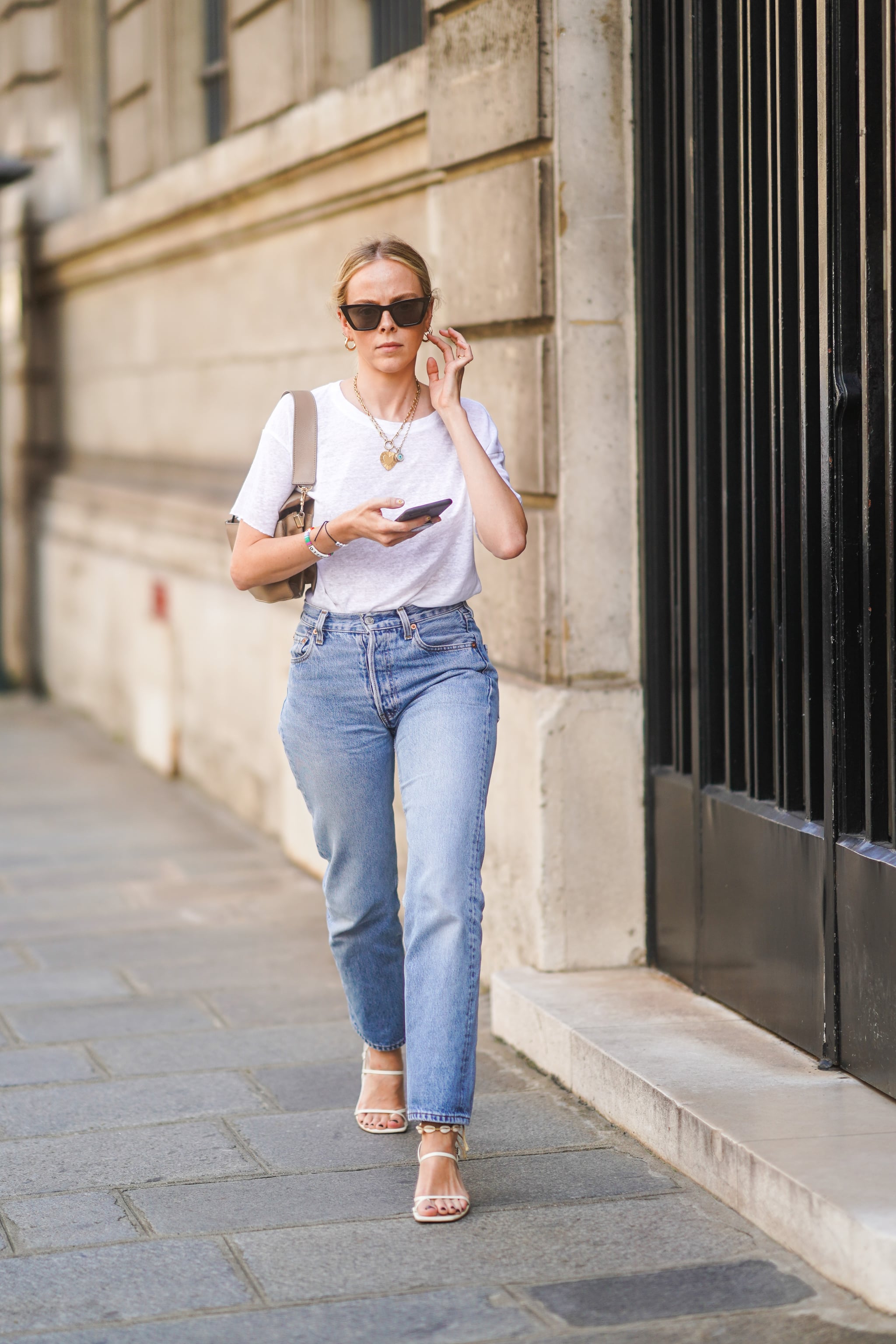 Think Simple: A White Tee, Mom Jeans, and Strappy White Sandals Make the  Perfect Look, 31 Ways to Team Up Your Jeans and Sandals For the Win