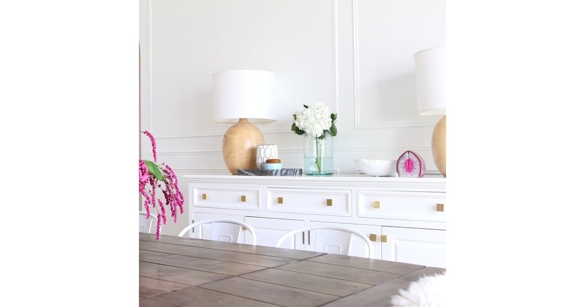 The finds a patterned tray, some decorative jars, and agate bookends