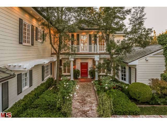The home's rambling 11,750-square-foot configuration — its shape can best be described as hourglass-like — makes locating the main entrance challenging.