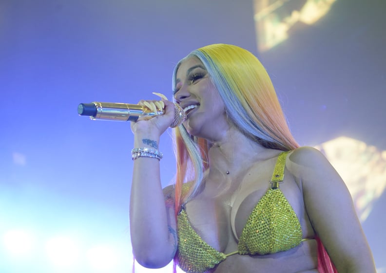 Cardi B With Neon Yellow Nails