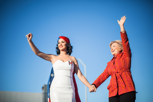"A roaring good time at the Iowa JJ," Hillary Clinton wrote on her Twitter, her tie-waist button-up complementing Katy's Eugenia Kim head wrap.