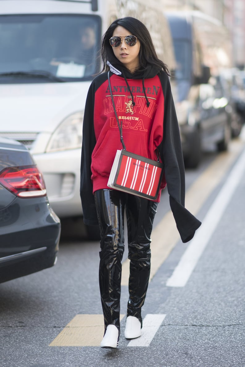 College-Sweatshirt Outfit: Allow Patent-Leather Pants to Play Up Your Gear
