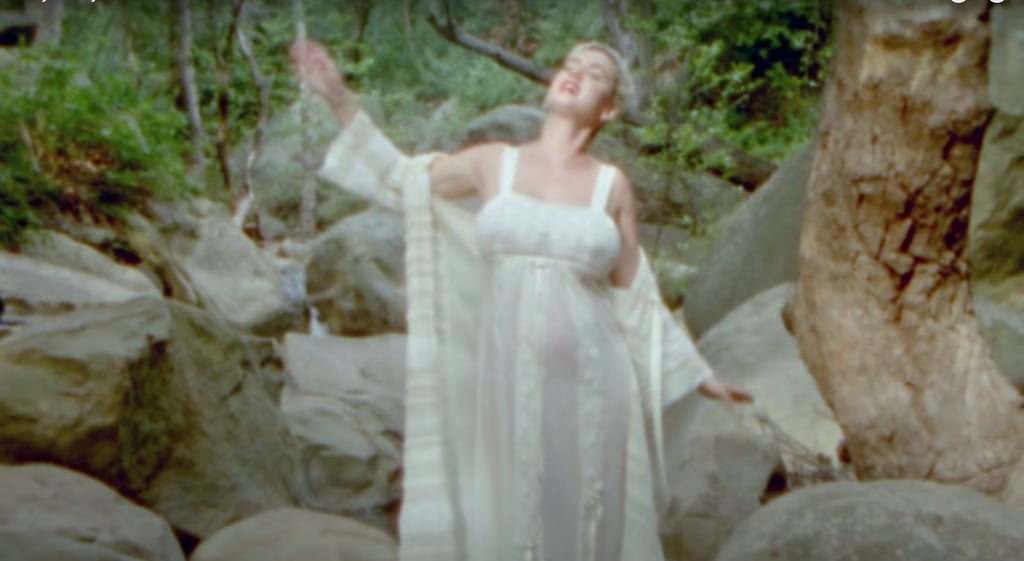 See Katy Perry's White Lace Dresses in "Daisies" Music Video