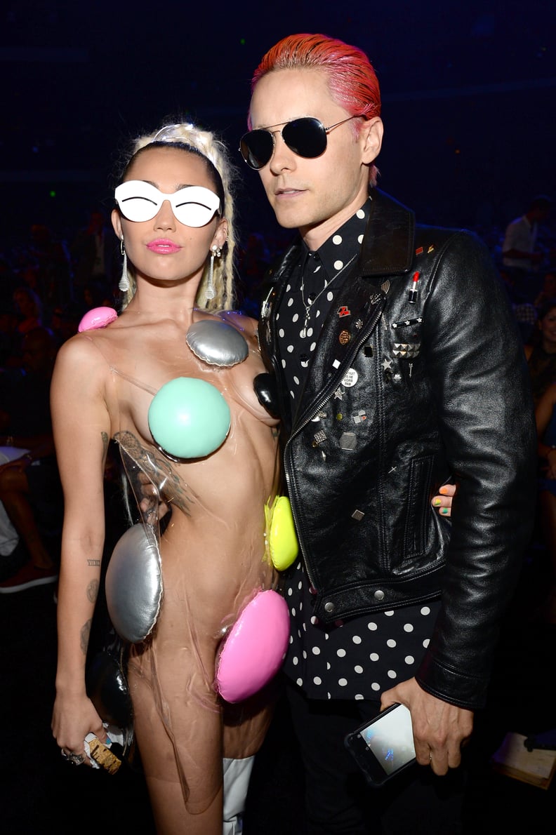 Or pose with a nearly naked Miley Cyrus.