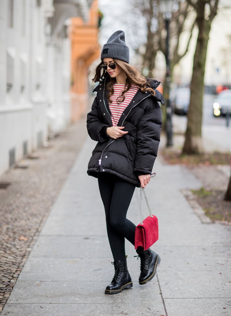 With a chic striped shirt and on-trend puffer.