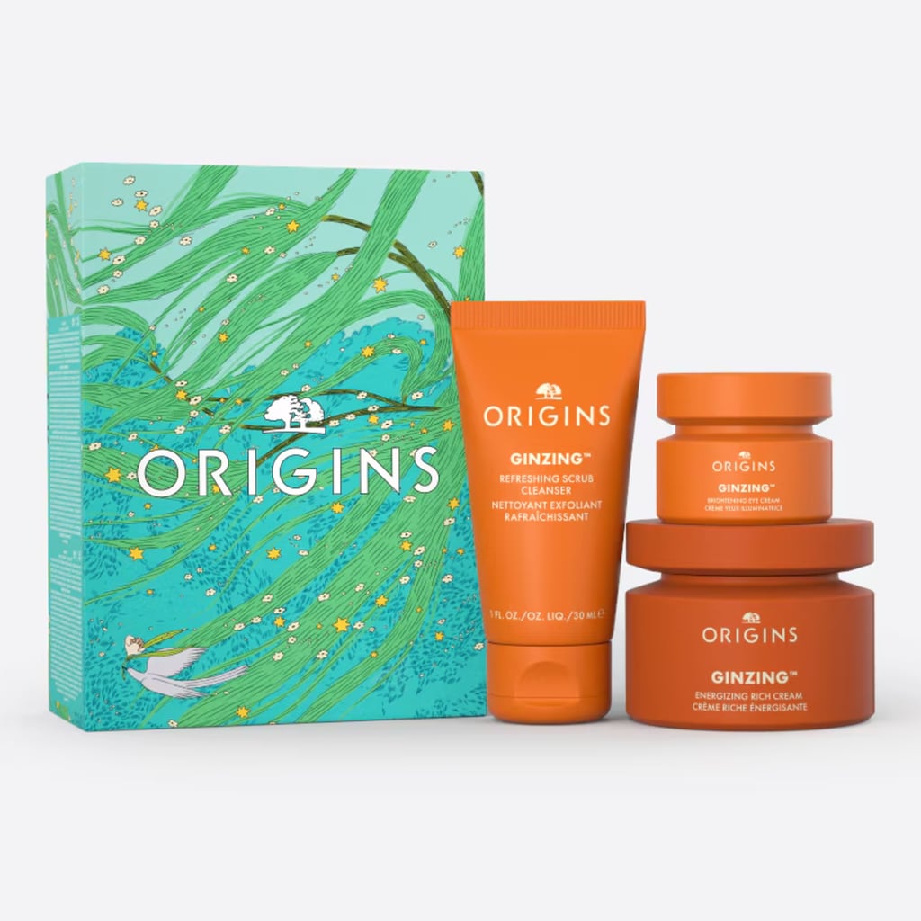 Origins GinZing Glowing Essentials Gift Set  ($35, originally $50)
I've always had a soft spot for Origins' packaging; the bold orange and clean, simple design just makes me happy every time I see it. But what I love even more is that the brand puts together great affordable gift sets, like this glow-boosting trio. Inside is a scrub cleanser, a full-size cream, and an eye cream — all powered by brightening vitamin C and ginseng, hydrating hyaluronic acid, depuffing caffeine, and smoothing niacinamide.