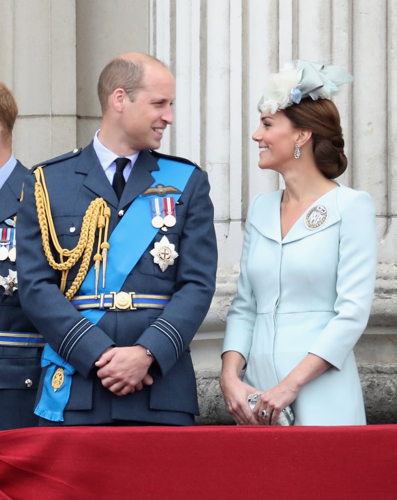 LONDON, ENGLAND - JULY 10: Prince William, Duke of Cambridge and Catherine, Duchess of Cambridge watch the RAF flypast on the balcony of Buckingham Palace, as members of the Royal Family attend events to mark the centenary of the RAF on July 10, 2018 in L