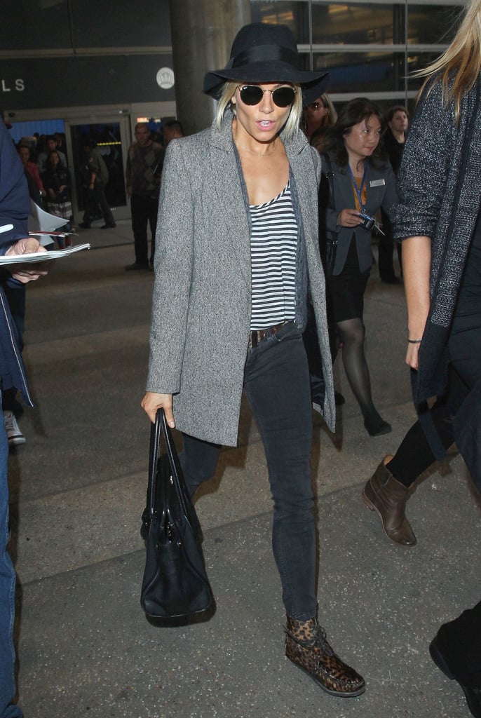 Sienna Miller touched down at LAX on Friday.