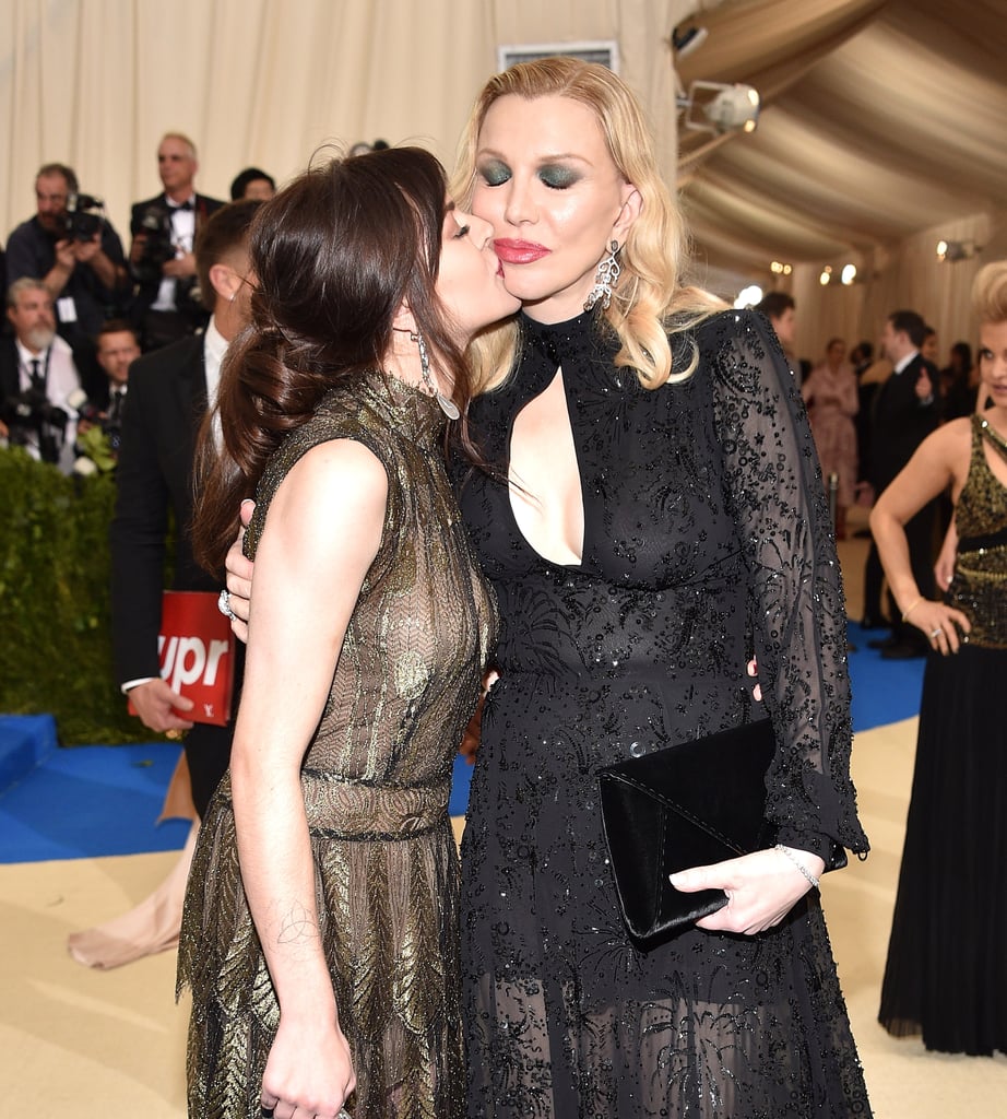 Courtney Love and her daughter, Frances Bean Cobain, arrived together for the Met Gala in NYC on Monday night. The mother-daughter duo hit the red carpet with longtime friend Marc Jacobs and model Char Defrancesco and shared a few kisses for the cameras. While the two haven't always been close — 24-year-old Frances famously emancipated herself from her mother in 2009 — the pair was spotted holding hands in Manhattan ahead of the big event and seemed to be having a great time together at the gala.   

    Related:

            
            
                                    
                            

            22 Candid Quotes That Might Make You Love Courtney Love