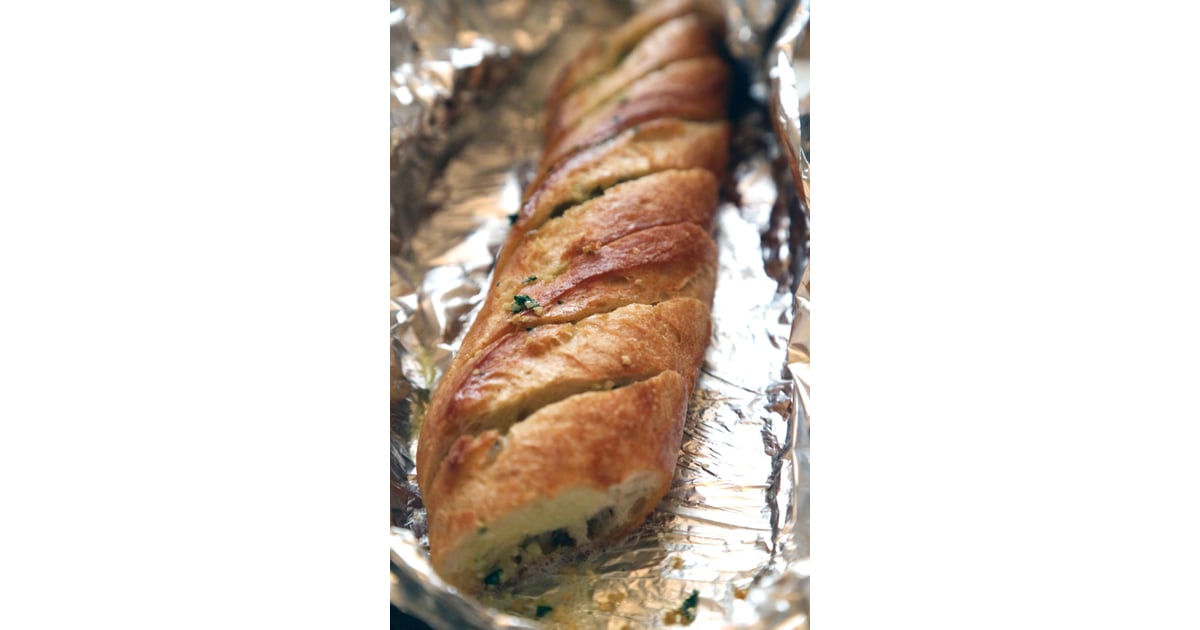 When making garlic bread, keep the loaf intact and wrapped in foil