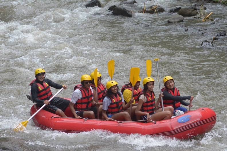 Here he is white water rafting in Bali with his family.