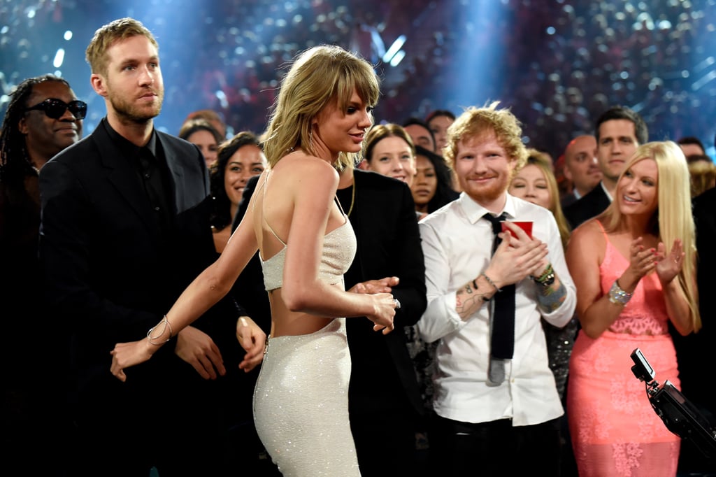 And Here's Ed Just Adorably Smiling at Taylor With His Cup
