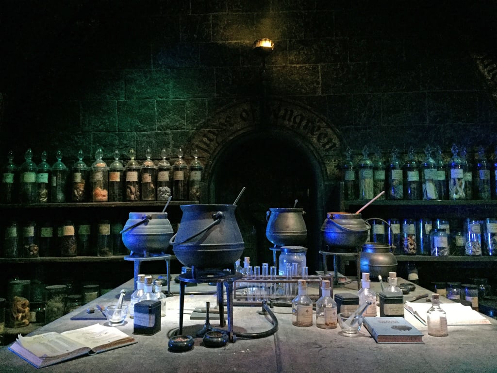 The stirring sticks in the cauldrons were all moving.