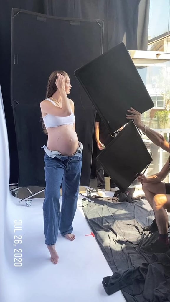 Baby bump photo or pregnant woman in Calvin Klein and Jean jacket