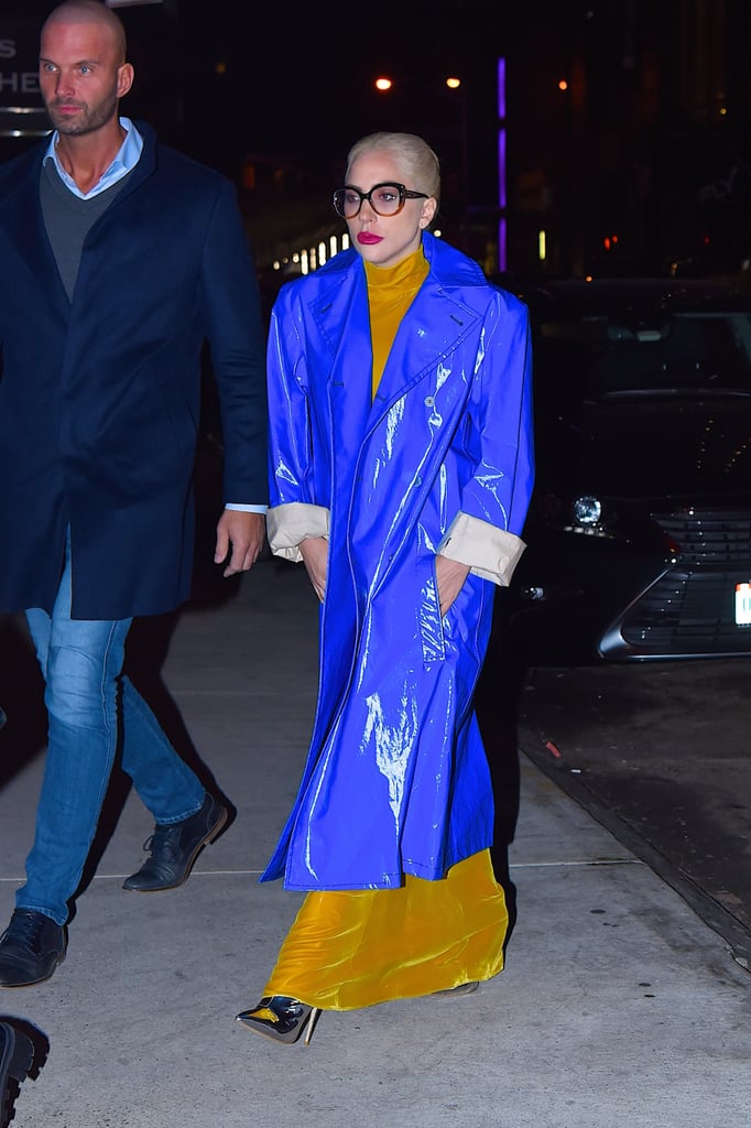 She wore this electric blue trench coat for a date night with her fiancé Christian Carino.