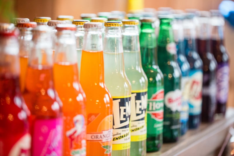 This is such a fun way to display beverages and also very easy to re-create using colored juice boxes, cans of soda, or even different pitchers or beverage dispensers of rainbow colored drinks.
