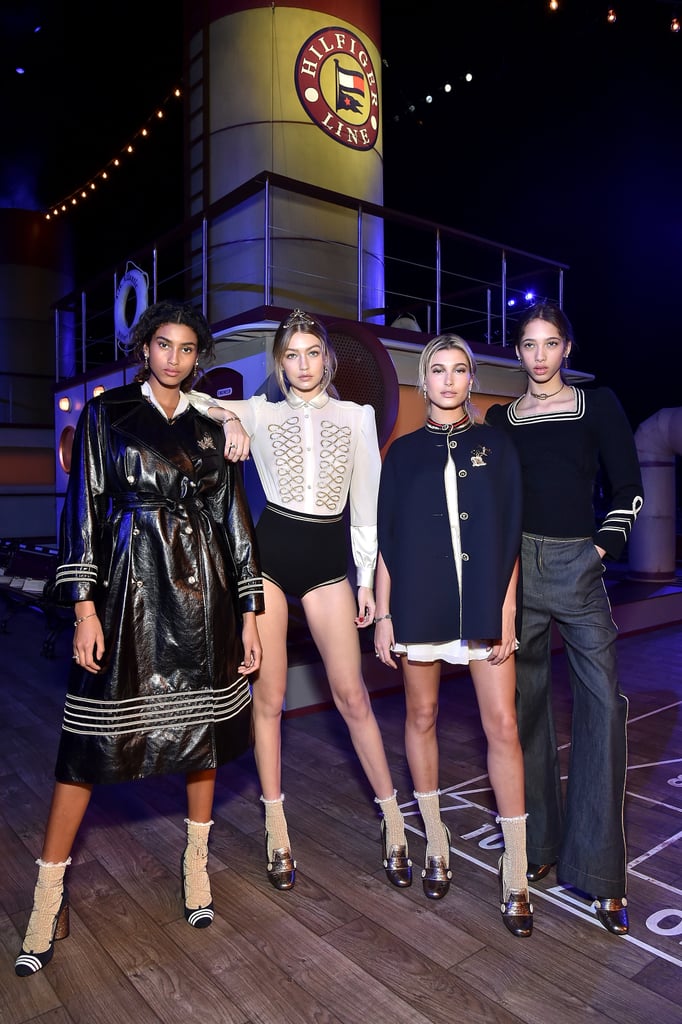 Gigi hung out backstage at Tommy Hilfiger's sailor-themed show, posing with Imaan Hammam, Hailey Baldwin, and Yasmin Wijnaldum in front of the TH Atlantic ship.