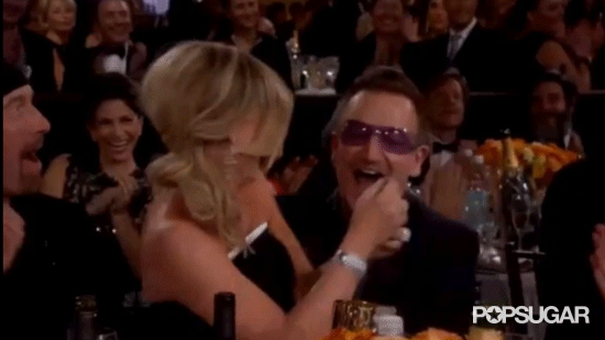Amy Poehler Makes Out With Bono