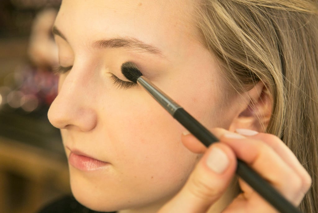 Heading back up to the eyes, Bettelli prepped the lids with Blot Powder ($26) to prevent greasy eyelids and eye shadow slippage.
She then applied a warm tawny eye shadow — Pro Longwear in Always Sunny ($21) — all over the lids, connecting it under the lower lids as well.