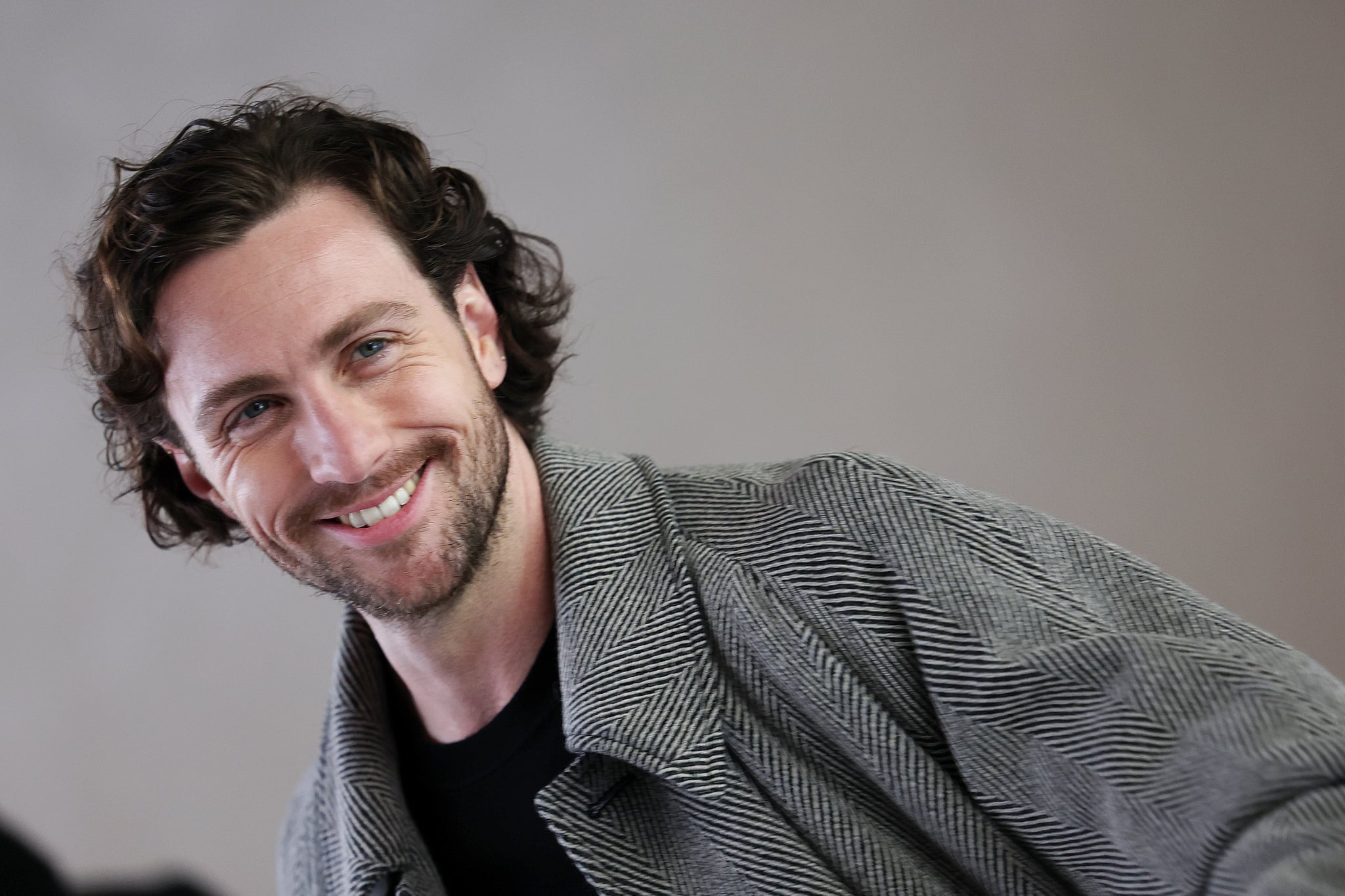 MILAN, ITALY - FEBRUARY 25: Aaron Taylor-Johnson attends the Giorgio Armani fashion show during the Milan Fashion Week Womenswear Fall/Winter 2024-2025 on February 25, 2024 in Milan, Italy. (Photo by Vittorio Zunino Celotto/Getty Images)