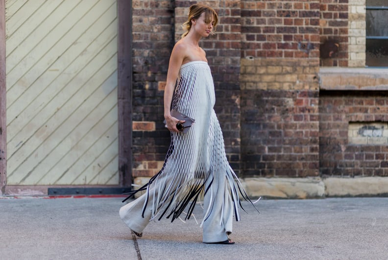 A Strapless Dress Over Wide-Leg Pants Is a Winning Combination With a Casual Touch