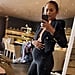 Chrissy Teigen Shows Her Baby Bump in Leggings and a Blazer