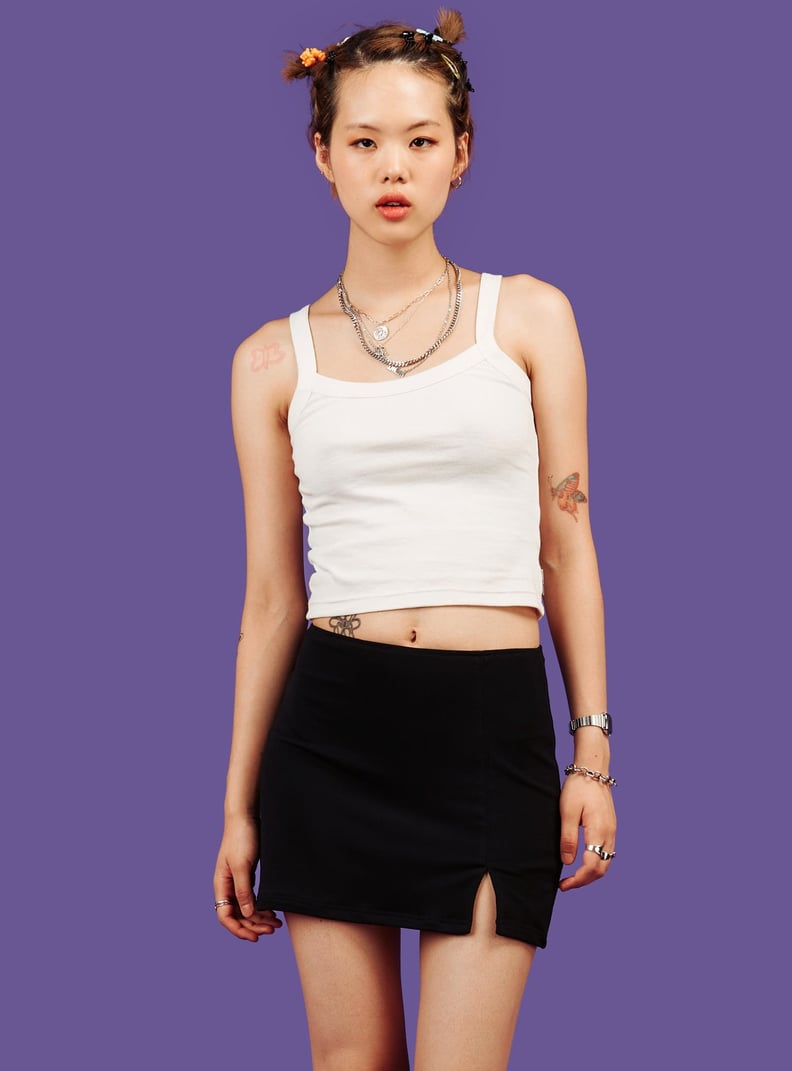 Olivia Rodrigo flexes her mini skirt and crop top from an iconic '90s  runway archive